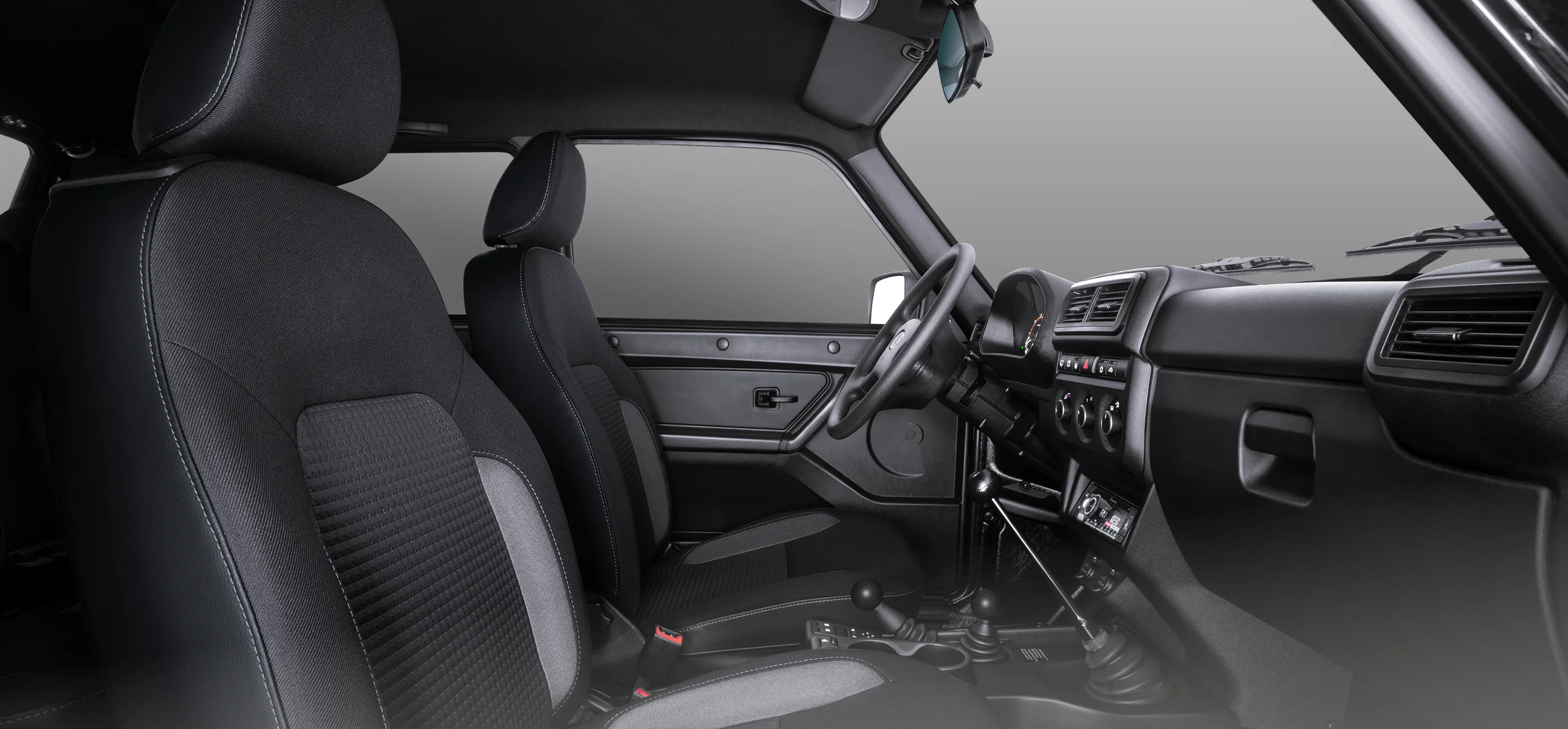 Интерьер LADA Niva Bronto&nbsp;— передние сиденья, рычаги раздатки и&nbsp;блокировок